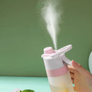 Bouteille d'eau pulvérisatrice