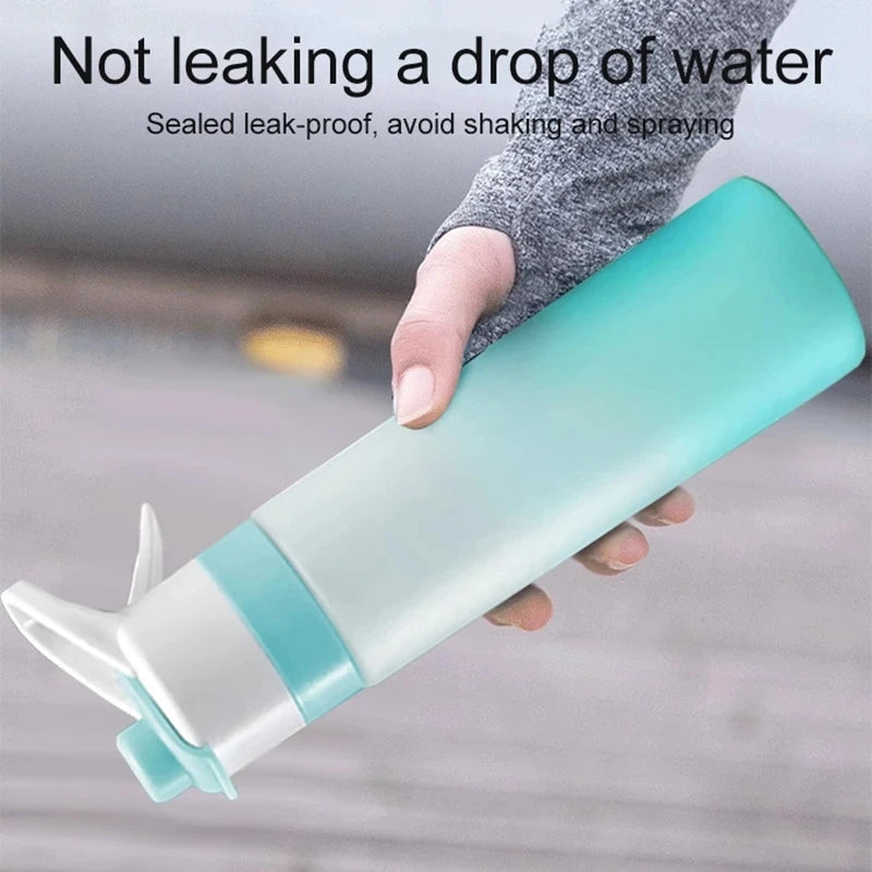 Bouteille d'eau pulvérisatrice